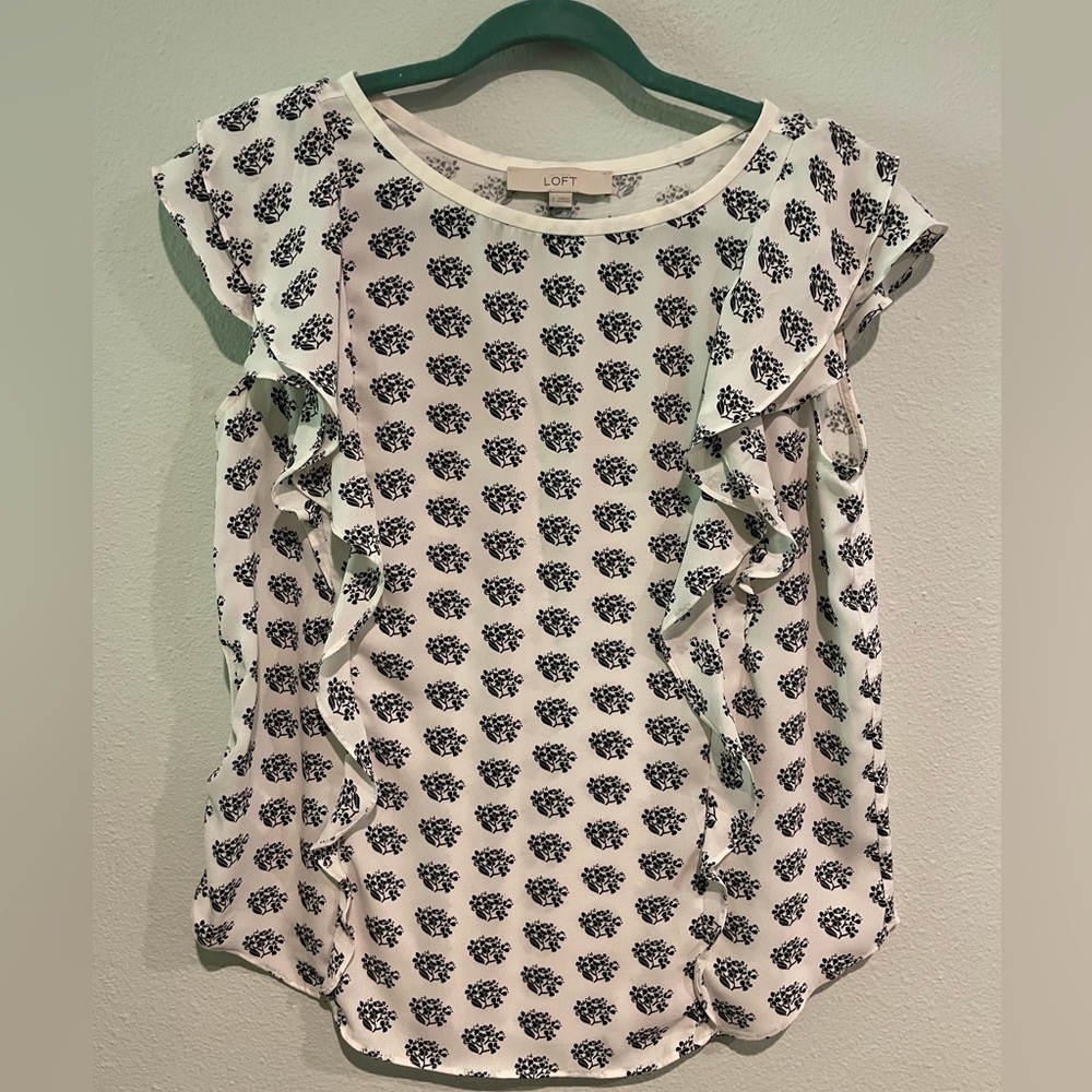 Loft women’s white shirt with black design.  Ruffle detail down front. S…